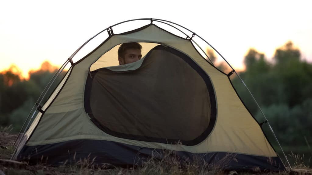 Joyfulmanzippingdometentpreparingtosleepinwildcomfortablerest